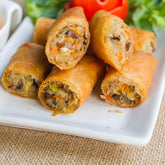 Crispy vegetable spring rolls with fresh mixed vegetables in golden pastry. Served with Mi Sauce. Order the best spring rolls near you from MiBurger for takeawa