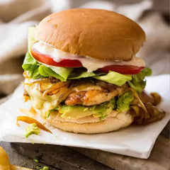Tender halal chicken fillet burger with fresh onion, tomato, cucumber and lettuce. Order the best halal chicken burger near you from MiBurgers for takeaway