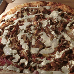 Delicious halal doner pizza with doner meat, green peppers and cheese on tomato sauce base. Order the best halal doner pizza near you from MiBurgers for takeawa