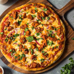 Halal chicken tikka pizza with tikka pieces - Mi Burger Nottingham